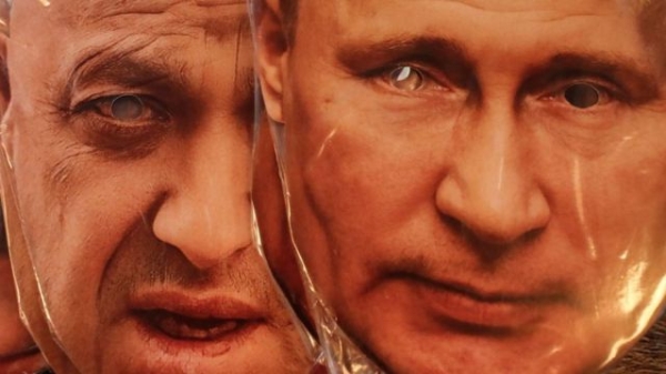 Face masks depicting Wagner chief Yevgeny Prigozhin and Russian President Vladimir Putin displayed for sale at a souvenir market in St. Petersburg, 28 June 2023