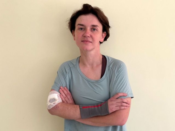 Andriana pictured with a bandaged arm at the rehabilitation centre in Ukraine