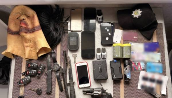 Нацполіція схопила членів угруповання, що вибивали “борги” з громадян та здійснювали навмисні підпали.