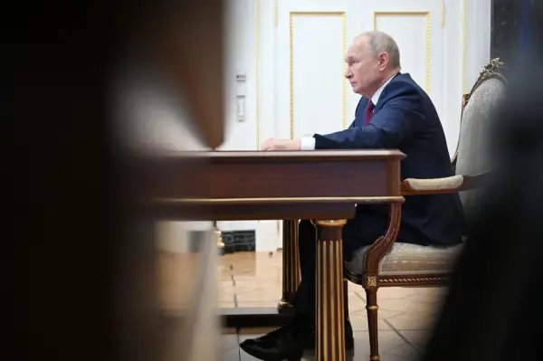 путін